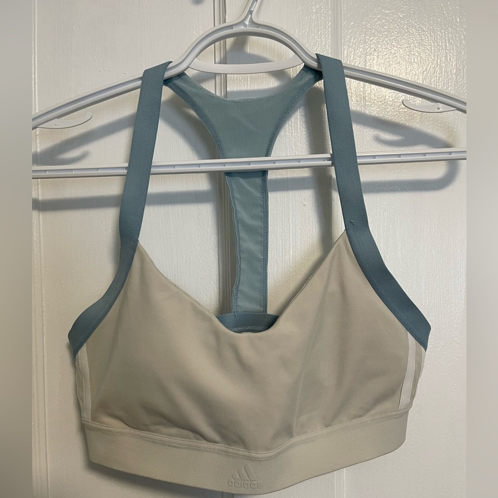Adidas women’s sports bra, ivory/grey with blue and white accents